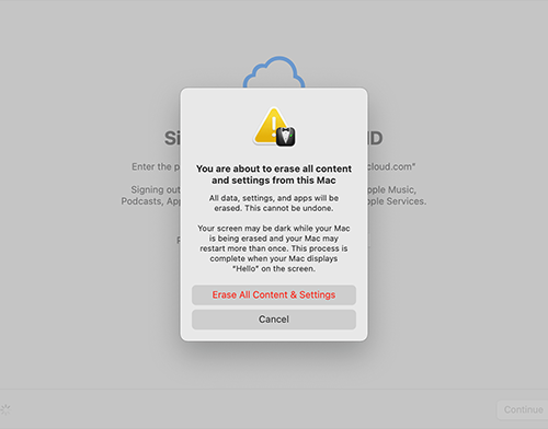Pop-up warning on a Mac screen, alerting about erasing all content and settings, with "Erase All Content & Settings" and "Cancel" options displayed.